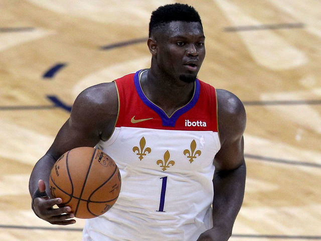 NEW ORLEANS, LOUISIANA - MAY 04: Zion Williamson #1 of the New Orleans Pelicans dribbles the ball downn court during the fourth quarter of an NBA game against the Golden State Warriors at Smoothie King Center on May 04, 2021 in New Orleans, Louisiana.