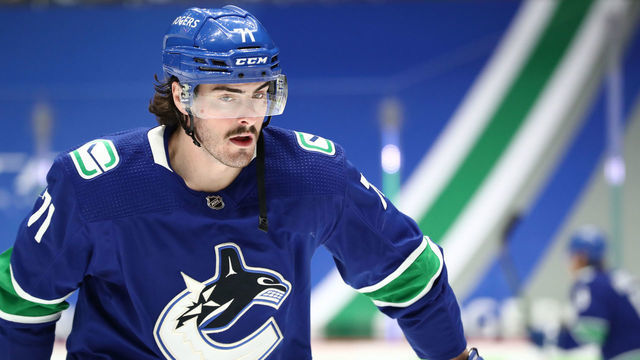 VANCOUVER, BC - MAY 03: Vancouver Canucks Winger Zack MacEwen (71) warms up before playing the Edmonton Oilers during their NHL game at Rogers Arena on May 3, 2021 in Vancouver, British Columbia, Canada.