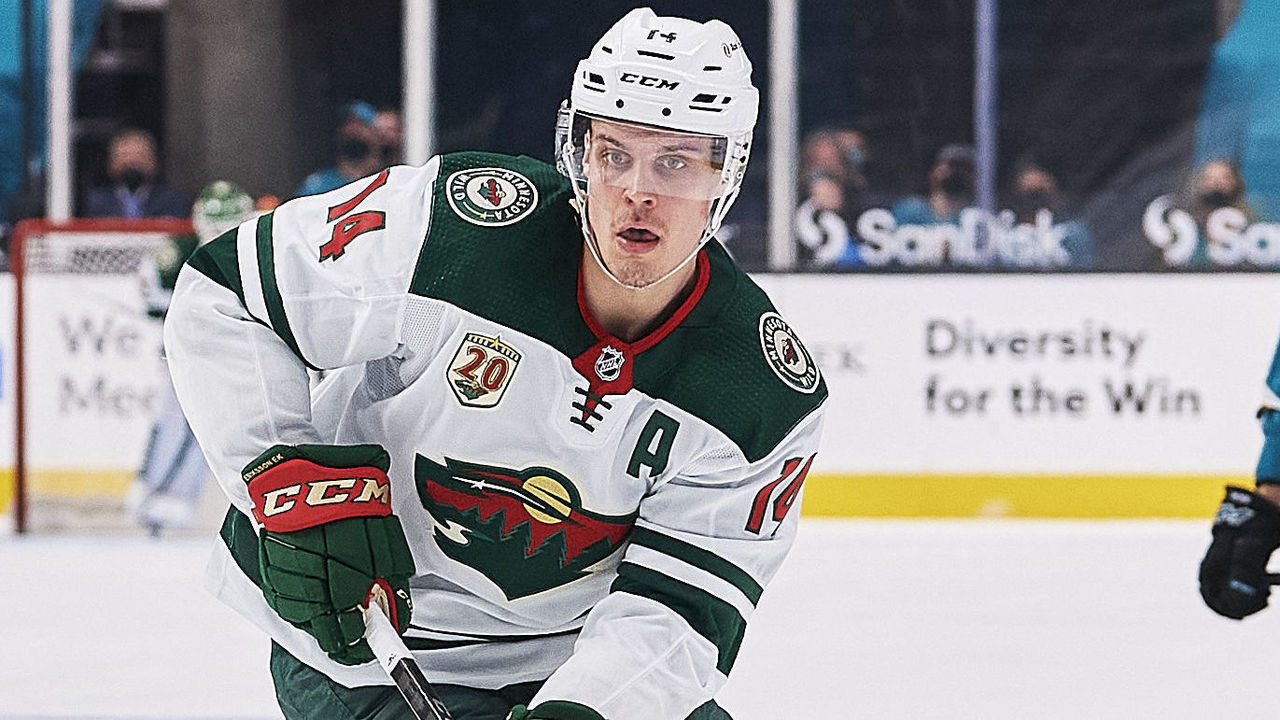 SAN JOSE, CA - MARCH 31: Minnesota Wild center Joel Eriksson Ek (14) carries the puck during the San Jose Sharks game versus the Minnesota Wild on March 31, 2021, at SAP Center at San Jose in San Jose, CA.