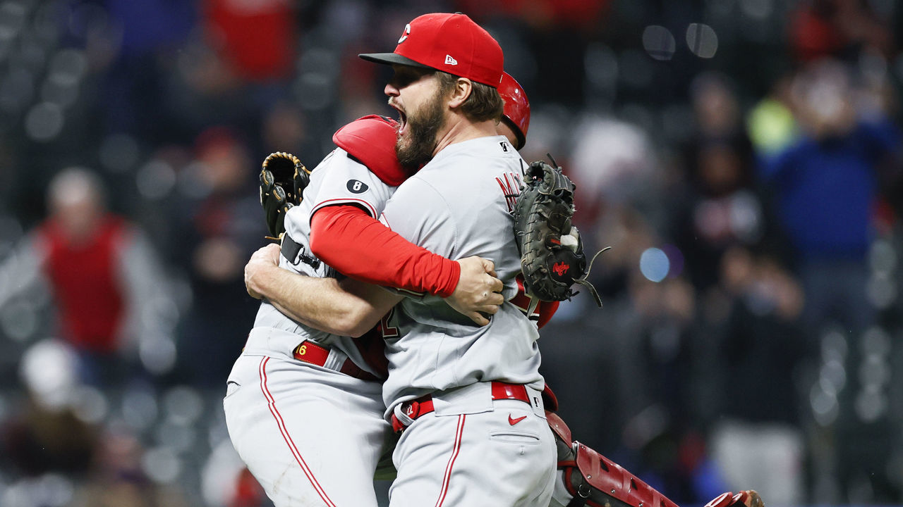 CLEVELAND, OH - MAY 07: Wade Miley #22 of the Cincinnati Reds celebrates with Tucker Barnhart #16 after pitching a no-hitter against the Cleveland Indians at Progressive Field on May 07, 2021 in Cleveland, Ohio. The Reds defeated the Indians 3-0.