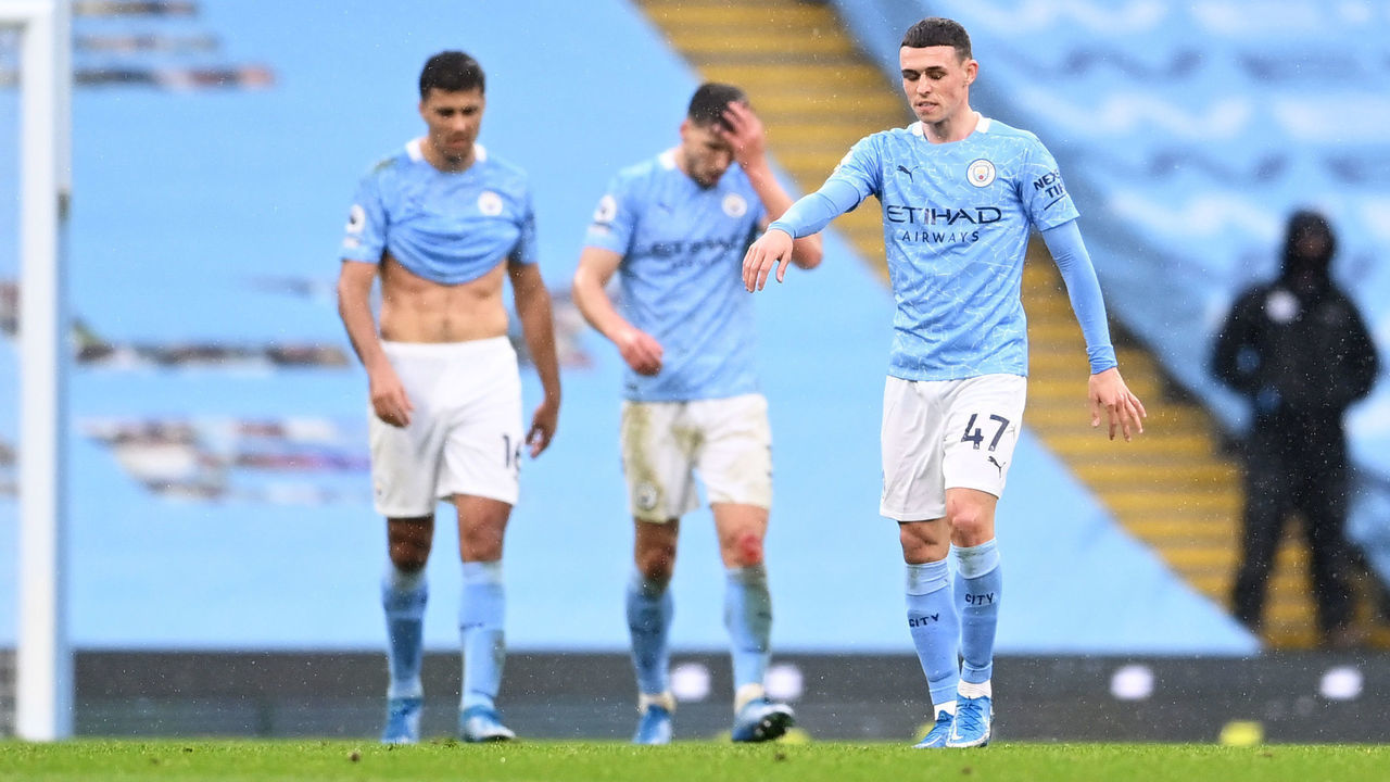 MANCHESTER, ENGLAND - MAY 08: Phil Foden of Manchester City looks dejected after conceding their side's second goal scored by Marcos Alonso of Chelsea (not pictured) during the Premier League match between Manchester City and Chelsea at Etihad Stadium on May 08, 2021 in Manchester, England. Sporting stadiums around the UK remain under strict restrictions due to the Coronavirus Pandemic as Government social distancing laws prohibit fans inside venues resulting in games being played behind closed doors.