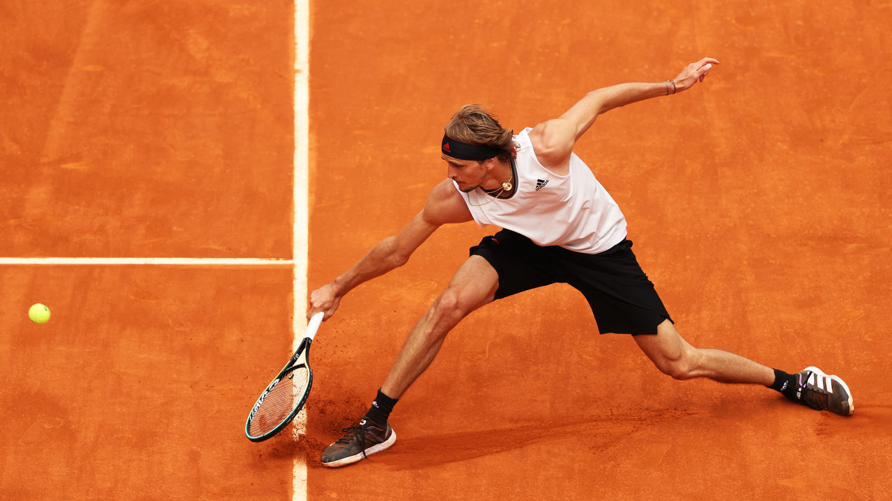 GLASGOW, SCOTLAND - MAY 08: Alexander Zverev hits a forehand during his match against Dominic Thiem during Day Ten of the Mutua Madrid Open at La Caja Magica on May 08, 2021 in Madrid, Spain.