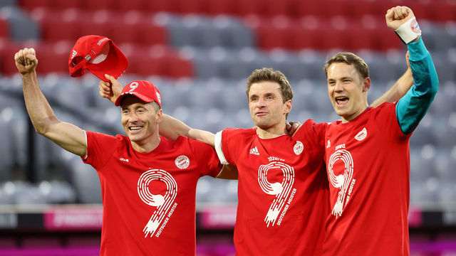 MUNICH, GERMANY - MAY 08: Robert Lewandowski, Thomas Mueller and Manuel Neuer of FC Bayern Muenchen celebrates winning the Bundesliga title after the Bundesliga match between FC Bayern Muenchen and Borussia Moenchengladbach at Allianz Arena on May 08, 2021 in Munich, Germany. Sporting stadiums around Germany remain under strict restrictions due to the Coronavirus Pandemic as Government social distancing laws prohibit fans inside venues resulting in games being played behind closed doors.