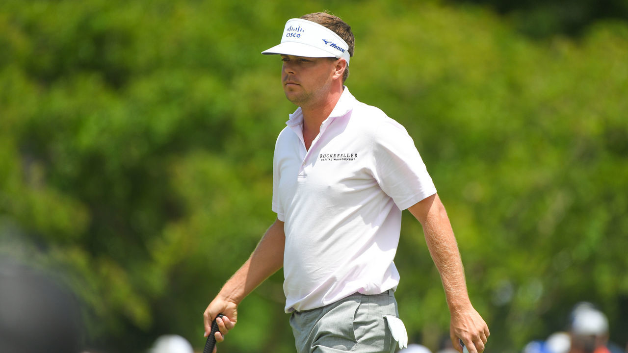 CHARLOTTE, NC - MAY 08: Keith Mitchell walks on the third green during the third round of the Wells Fargo Championship at Quail Hollow Club on May 8, 2021 in Charlotte, North Carolina.