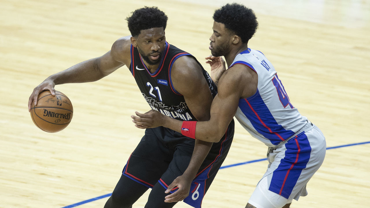 PHILADELPHIA, PA - MAY 08: Joel Embiid #21 of the Philadelphia 76ers dribbles the ball against Saddiq Bey #41 of the Detroit Pistons in the third quarter at the Wells Fargo Center on May 8, 2021 in Philadelphia, Pennsylvania. The 76ers defeated the Pistons 118-104.