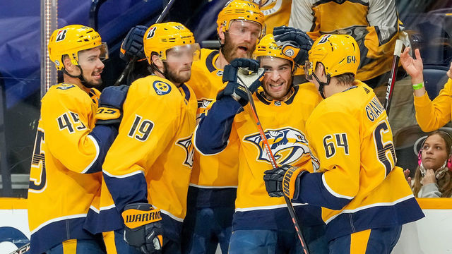 NASHVILLE, TN - MAY 8: Luke Kunin #11 of the Nashville Predators celebrates his goal against the Carolina Hurricanes during the second period at Bridgestone Arena on May 8, 2021 in Nashville, Tennessee.