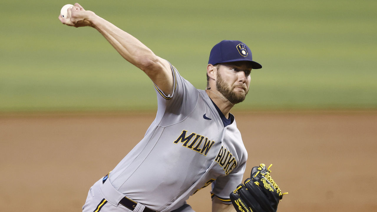 MIAMI, FLORIDA - MAY 08: Adrian Houser #37 of the Milwaukee Brewers delivers a pitch against the Miami Marlins during the first inning at loanDepot park on May 08, 2021 in Miami, Florida.