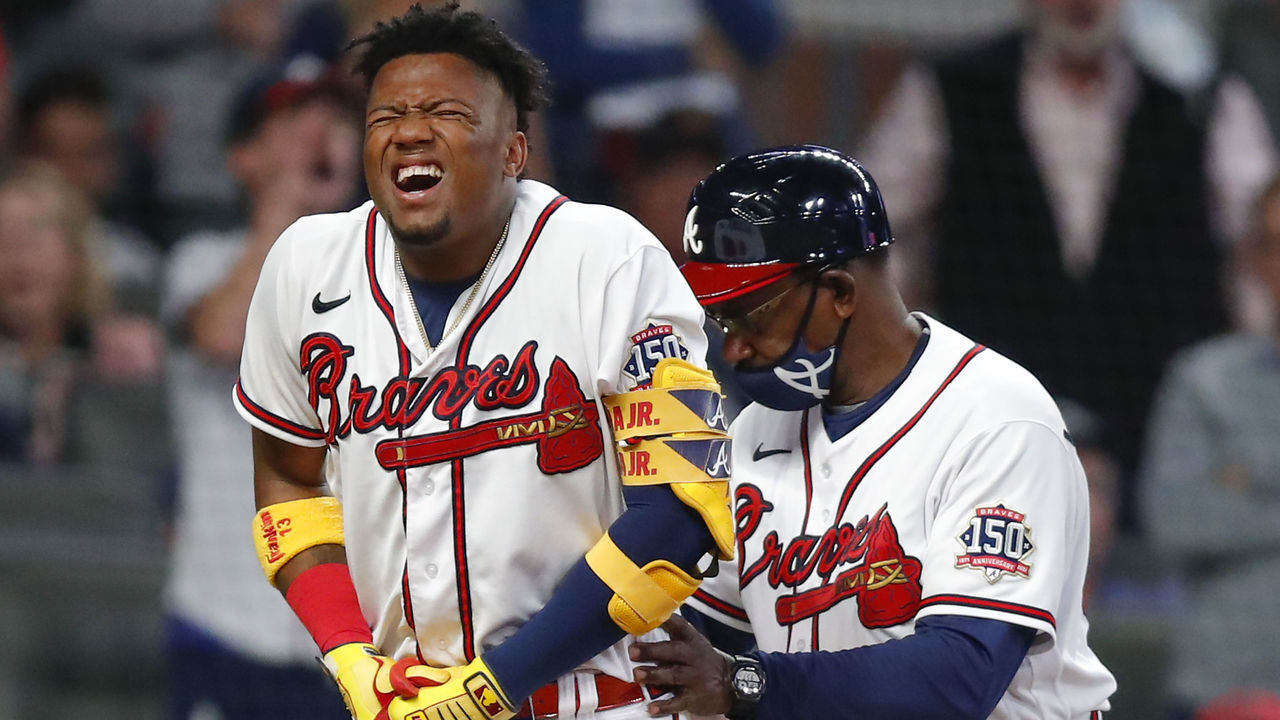 ATLANTA, GA - MAY 08: Ronald Acuna Jr. #13 of the Atlanta Braves reacts after being hit by a pitch in the seventh inning of an MLB game against the Philadelphia Phillies at Truist Park on May 8, 2021 in Atlanta, Georgia.