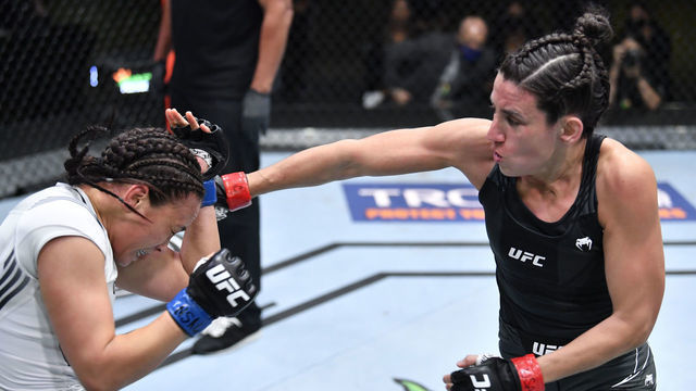 LAS VEGAS, NEVADA - MAY 08: (R-L) Marina Rodriguez of Brazil punches Michelle Waterson in a flyweight fight during the UFC Fight Night event at UFC APEX on May 08, 2021 in Las Vegas, Nevada.