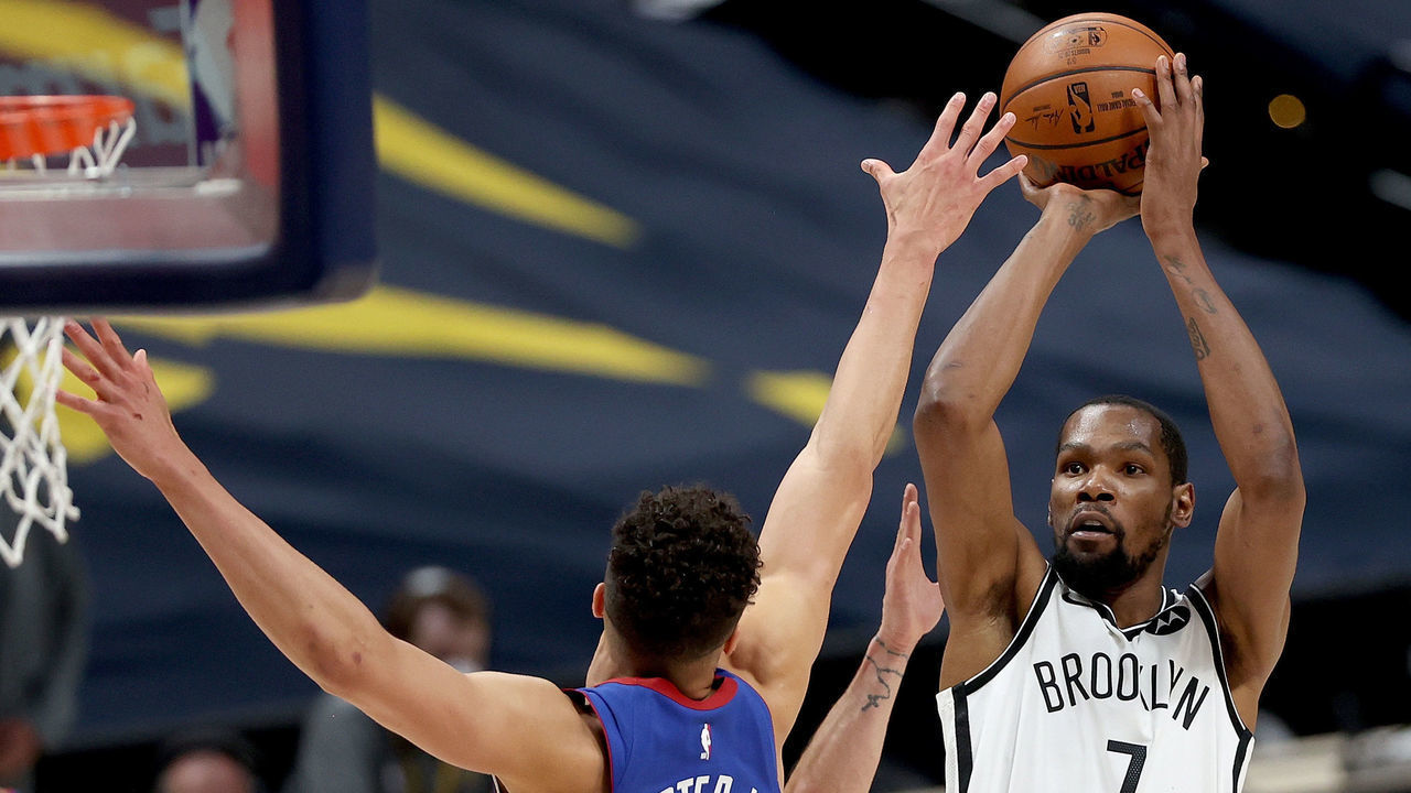DENVER, COLORADO - MAY 08: Kevin Durant #7 of the Brooklyn Nets puts up a shot over Michael Porter Jr. #1 of the Denver Nuggets in the fourth quarter at Ball Arena on May 08, 2021 in Denver, Colorado.