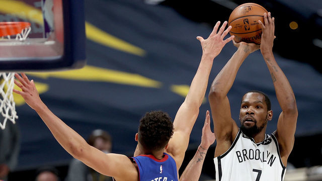DENVER, COLORADO - MAY 08: Kevin Durant #7 of the Brooklyn Nets puts up a shot over Michael Porter Jr. #1 of the Denver Nuggets in the fourth quarter at Ball Arena on May 08, 2021 in Denver, Colorado.