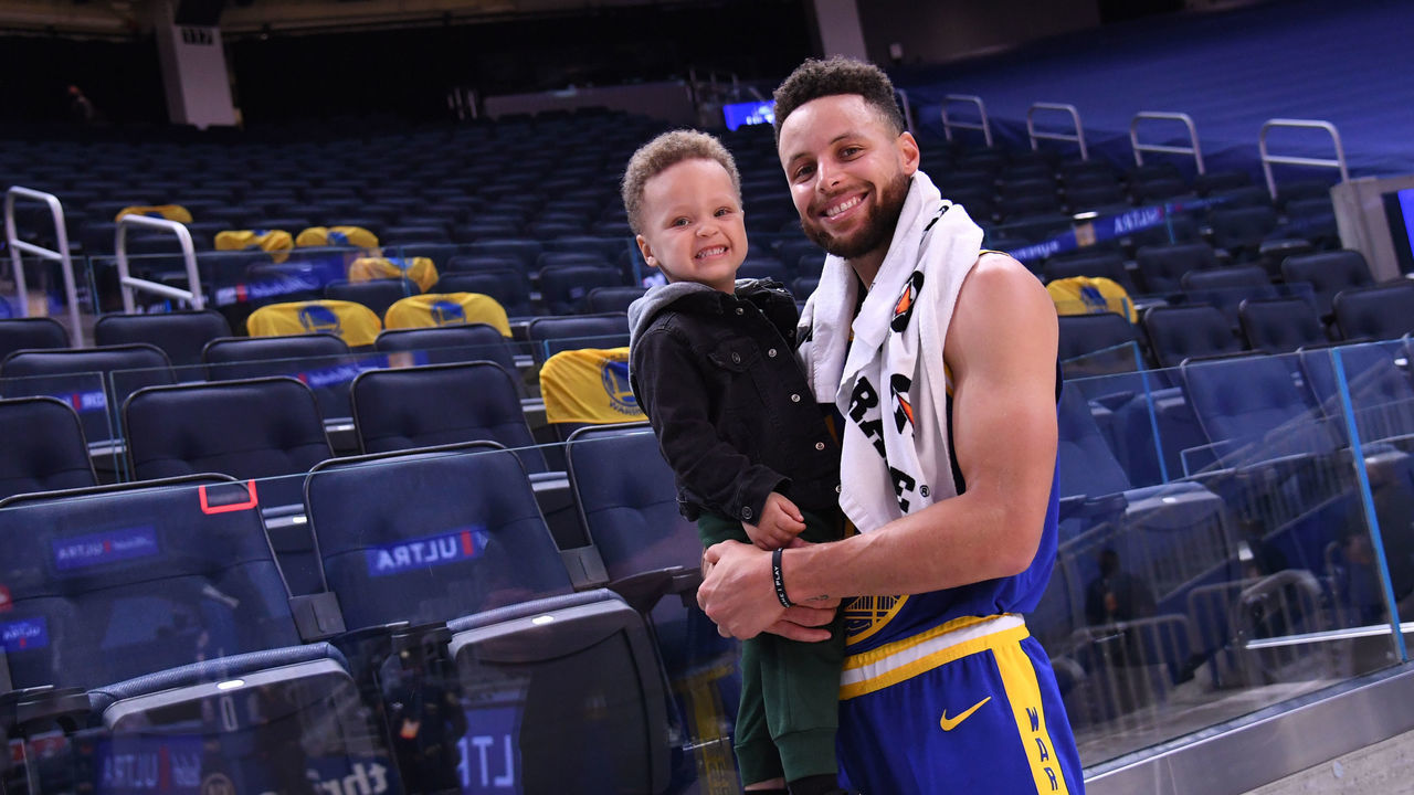 SAN FRANCISCO, CA - MARCH 14: Stephen Curry #30 of the Golden State Warriors poses with his son Canon after the game against the Utah Jazz on March 14, 2021 at Chase Center in San Francisco, California. NOTE TO USER: User expressly acknowledges and agrees that, by downloading and or using this photograph, user is consenting to the terms and conditions of Getty Images License Agreement. Mandatory Copyright Notice: Copyright 2021 NBAE