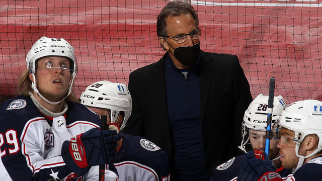 SUNRISE, FL - APRIL 3: Columbus Blue Jackets Head Coach monitors game progress from the bench along with Patrik Laine #29 against the Florida Panthers at the BB&T Center on April 3, 2021 in Sunrise, Florida.