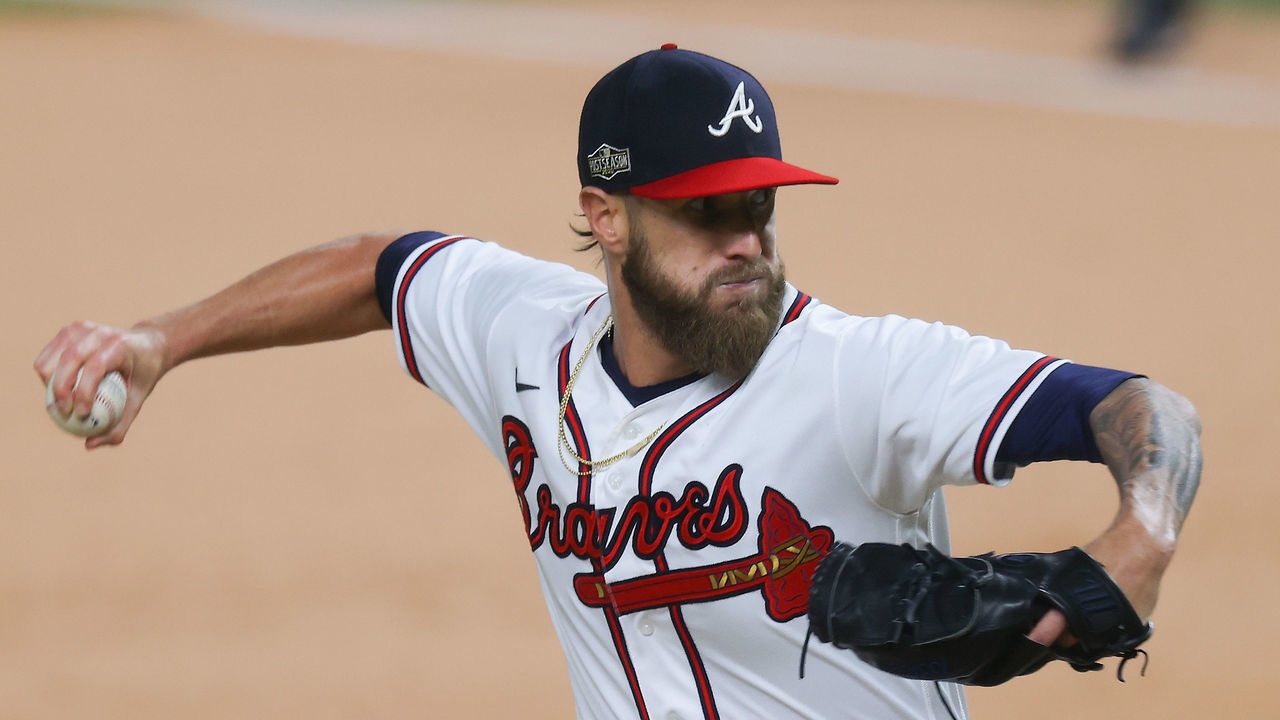 ARLINGTON, TEXAS - OCTOBER 15: Shane Greene #19 of the Atlanta Braves delivers the pitch against the Los Angeles Dodgers during the ninth inning in Game Four of the National League Championship Series at Globe Life Field on October 15, 2020 in Arlington, Texas.