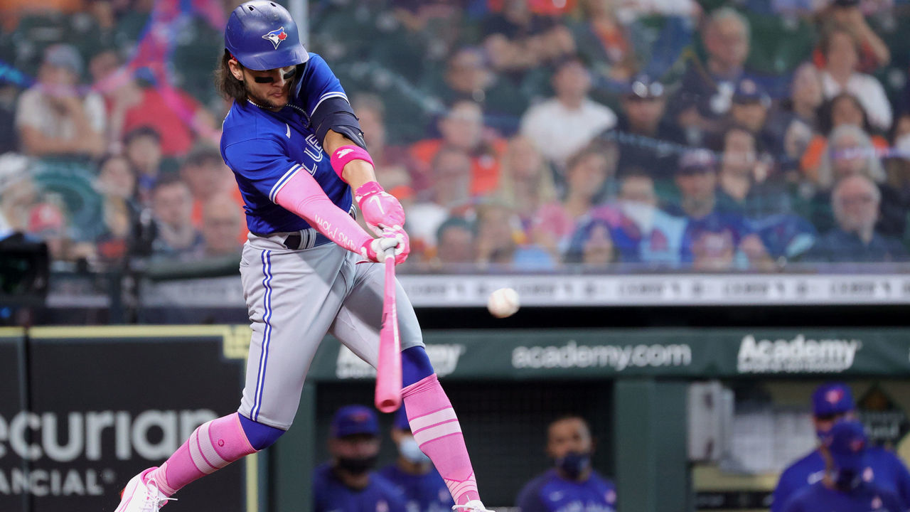 HOUSTON, TEXAS - MAY 09: Bo Bichette #11 of the Toronto Blue Jays singles during the third inning against the Houston Astros at Minute Maid Park on May 09, 2021 in Houston, Texas.