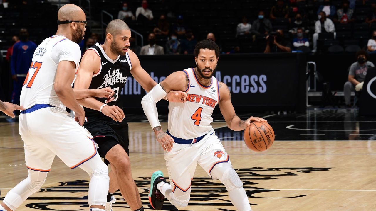 LOS ANGELES, CA - MAY 9: Derrick Rose #4 of the New York Knicks dribbles the ball during the game against the LA Clippers on May 9, 2021 at STAPLES Center in Los Angeles, California. NOTE TO USER: User expressly acknowledges and agrees that, by downloading and/or using this Photograph, user is consenting to the terms and conditions of the Getty Images License Agreement. Mandatory Copyright Notice: Copyright 2021 NBAE