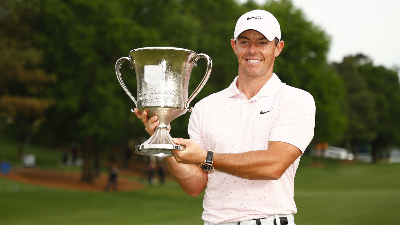 CHARLOTTE, NORTH CAROLINA - MAY 09: Rory McIlroy of Northern Ireland celebrates with the trophy after winning during the final round of the 2021 Wells Fargo Championship at Quail Hollow Club on May 09, 2021 in Charlotte, North Carolina.
