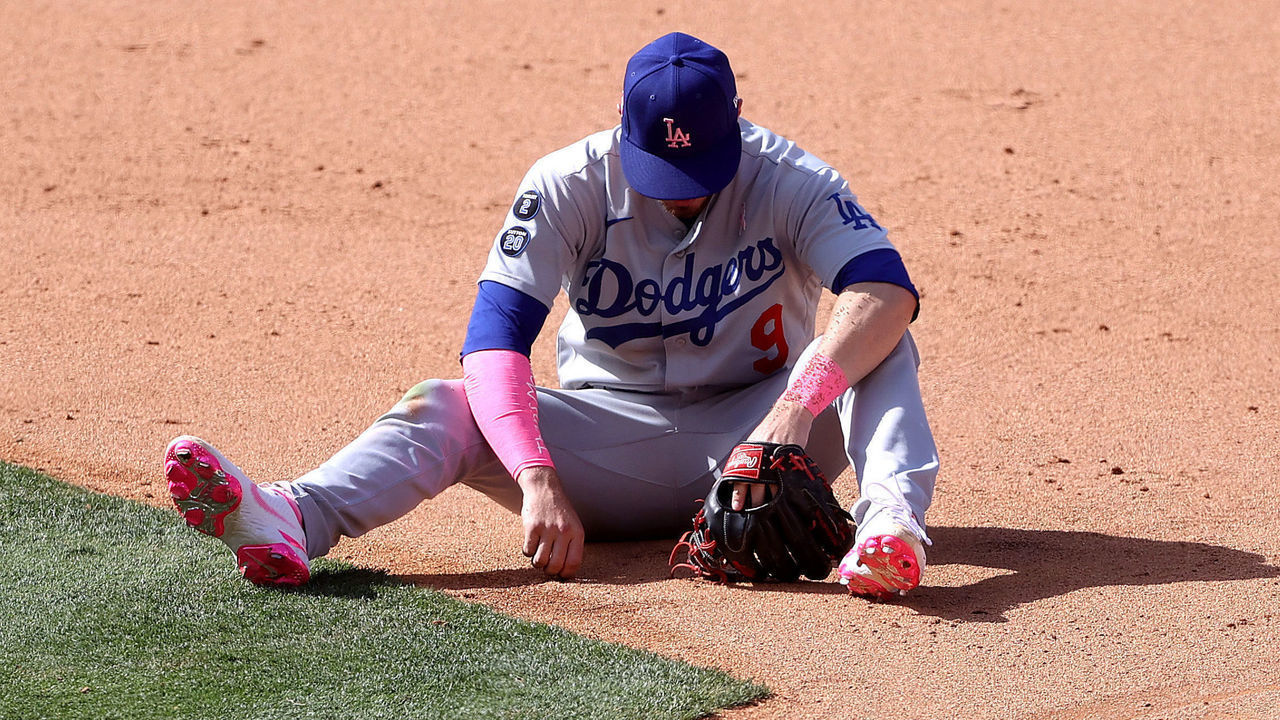 ANAHEIM, CALIFORNIA - MAY 09: Gavin Lux #9 of the Los Angeles Dodgers looks on after he was unable to handle the throw to tag out David Fletcher #22 of the Los Angeles Angels as he stole second base during the eighth inning of a game at Angel Stadium of Anaheim on May 09, 2021 in Anaheim, California.