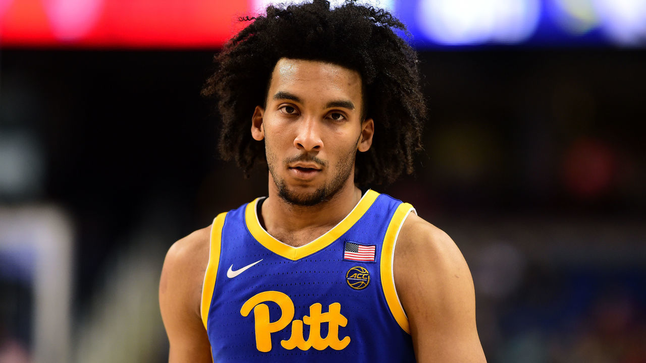 GREENSBORO, NORTH CAROLINA - MARCH 11: Justin Champagnie #11 of the Pittsburgh Panthers looks on during their game against the North Carolina State Wolfpack in the second round of the 2020 Men's ACC Basketball Tournament at Greensboro Coliseum on March 11, 2020 in Greensboro, North Carolina.