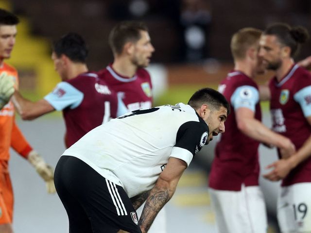 Fulham's Serbian striker Aleksandar Mitrovic reacts after the English Premier League football match between Fulham and Burnley at Craven Cottage in London on May 10, 2021. - RESTRICTED TO EDITORIAL USE. No use with unauthorized audio, video, data, fixture lists, club/league logos or 'live' services. Online in-match use limited to 120 images. An additional 40 images may be used in extra time. No video emulation. Social media in-match use limited to 120 images. An additional 40 images may be used in extra time. No use in betting publications, games or single club/league/player publications.