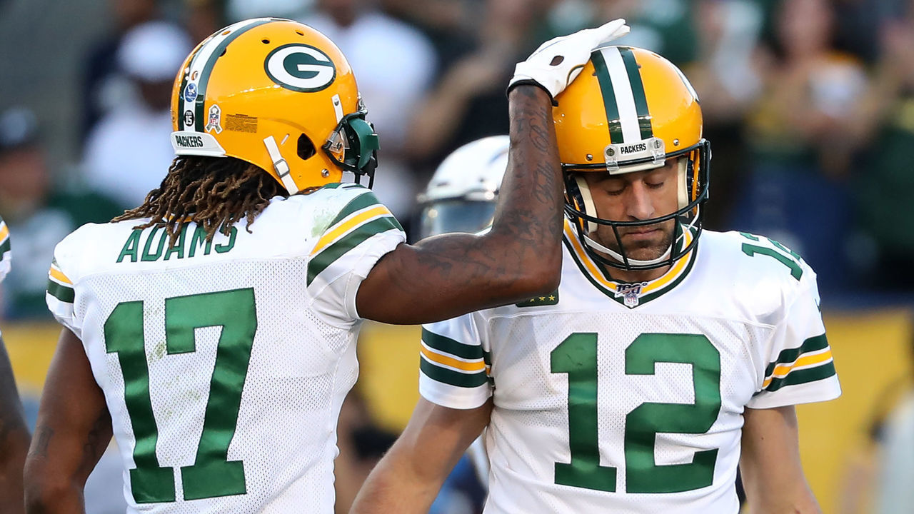 CARSON, CALIFORNIA - NOVEMBER 03: Davante Adams #17 congratulates Aaron Rodgers #12 of the Green Bay Packers after scoring a two-point conversion during the second half of a game against the Los Angeles Chargers at Dignity Health Sports Park on November 03, 2019 in Carson, California.