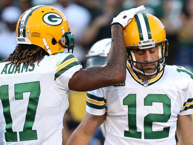CARSON, CALIFORNIA - NOVEMBER 03: Davante Adams #17 congratulates Aaron Rodgers #12 of the Green Bay Packers after scoring a two-point conversion during the second half of a game against the Los Angeles Chargers at Dignity Health Sports Park on November 03, 2019 in Carson, California.