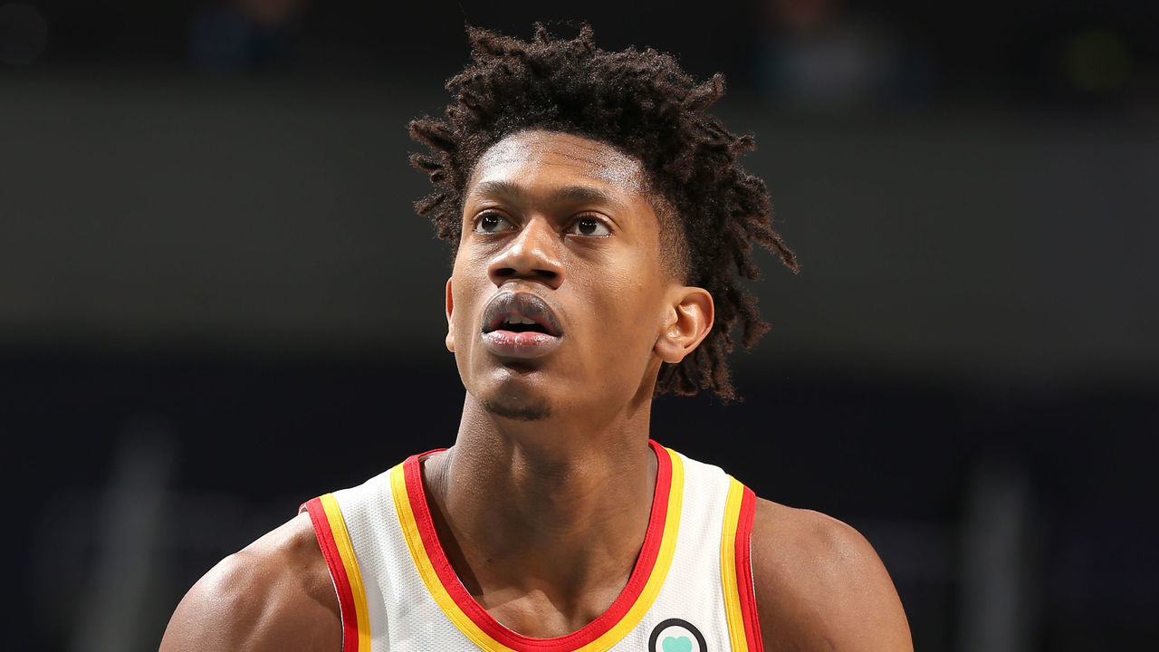 CHARLOTTE, NC - JANUARY 9: De'Andre Hunter #12 of the Atlanta Hawks shoots a free throw on January 9, 2021 at Spectrum Center in Charlotte, North Carolina. Mandatory Copyright Notice: Copyright 2021 NBAE