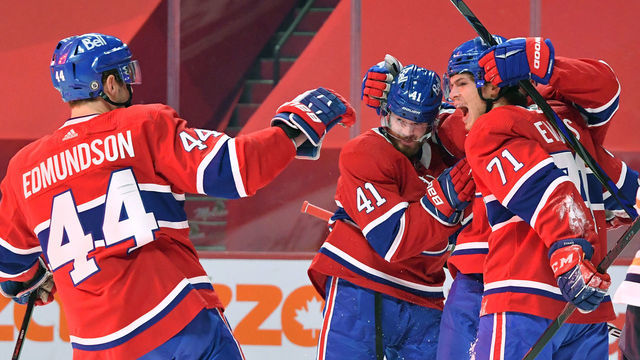 MONTREAL, QC - MAY 10: Jake Evans #71 of the Montreal Canadiens celebrates with teammates after scoring a goal against the Edmonton Oilers in the NHL game at the Bell Centre on May 10, 2021 in Montreal, Quebec, Canada.