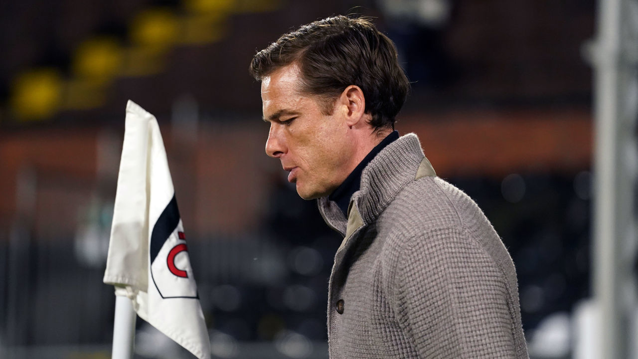 Fulham manager Scott Parker looks dejected after Fulham are relegated during the Premier League match at Craven Cottage, London. Picture date: Monday May 10, 2021.