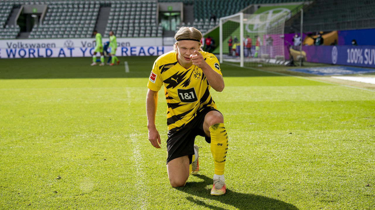 WOLSBURG, GERMANY - APRIL 24: Erling Haaland of Borussia Dortmund celebrates scoring his winning goal to the 0:2 during the Bundesliga match between VfL Wolfsburg and Borussia Dortmund at the Volkswagen Arena on April 24, 2021 in Wolfsburg, Germany.