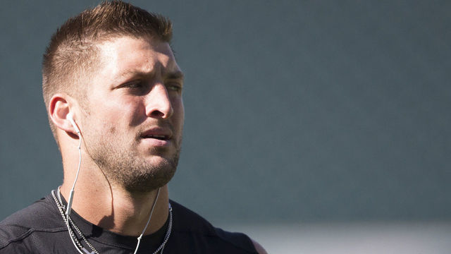 PHILADELPHIA, PA - AUGUST 22: Tim Tebow #11 of the Philadelphia Eagles warms up prior to the game against the Baltimore Ravens on August 22, 2015 at Lincoln Financial Field in Philadelphia, Pennsylvania.