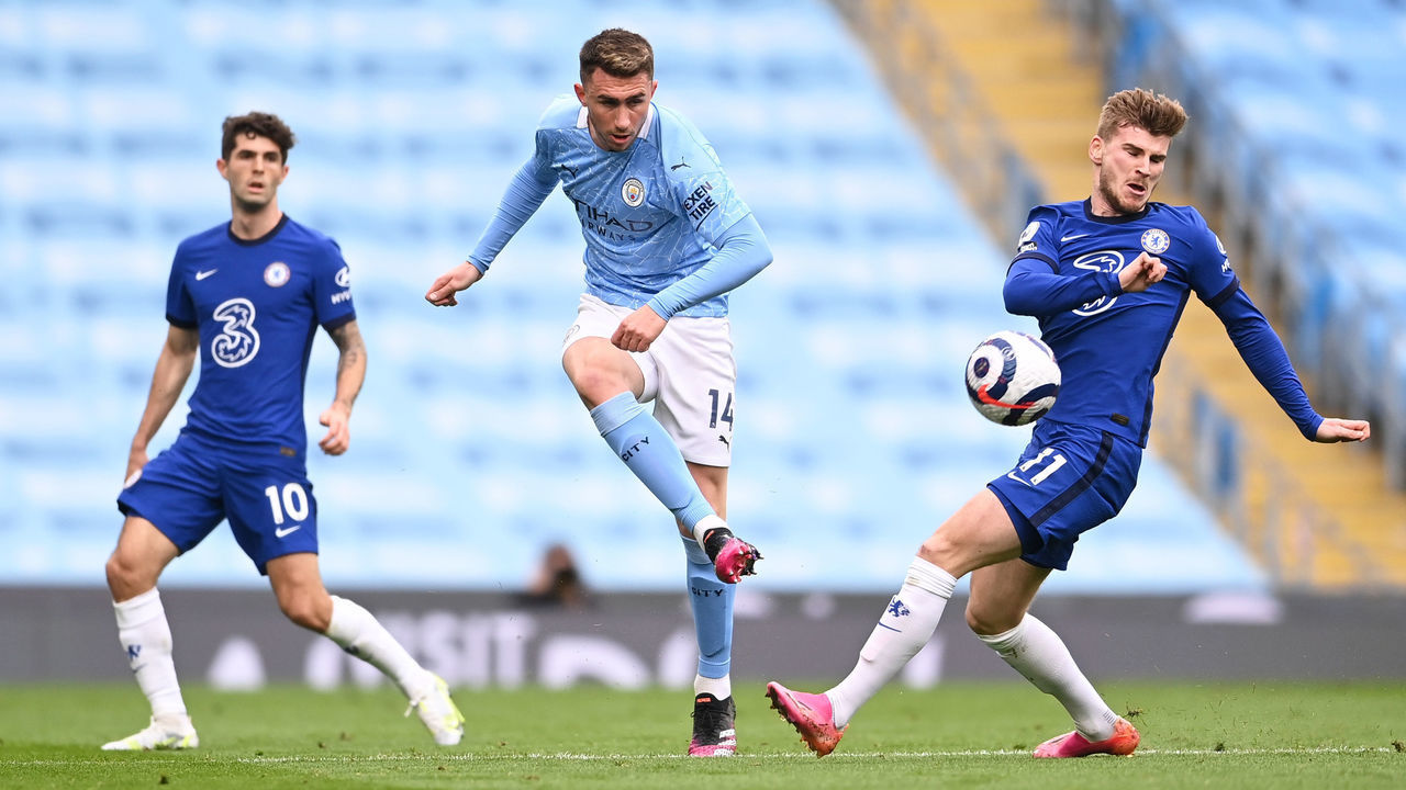 MANCHESTER, ENGLAND - MAY 08: Aymeric Laporte of Manchester City is closed down by Timo Werner of Chelsea during the Premier League match between Manchester City and Chelsea at Etihad Stadium on May 08, 2021 in Manchester, England. Sporting stadiums around the UK remain under strict restrictions due to the Coronavirus Pandemic as Government social distancing laws prohibit fans inside venues resulting in games being played behind closed doors.