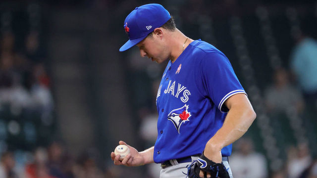 HOUSTON, TEXAS - MAY 09: Nate Pearson #24 of the Toronto Blue Jays looks down prior to being pulled during the third inning against the Houston Astros at Minute Maid Park on May 09, 2021 in Houston, Texas.