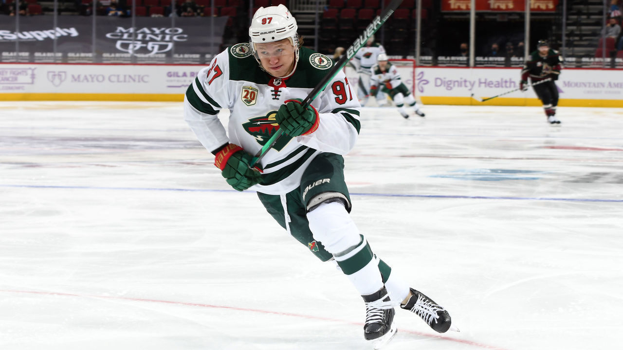GLENDALE, ARIZONA - APRIL 19: Kirill Kaprizov #97 of the Minnesota Wild skates up ice against the Arizona Coyotes at Gila River Arena on April 19, 2021 in Glendale, Arizona.