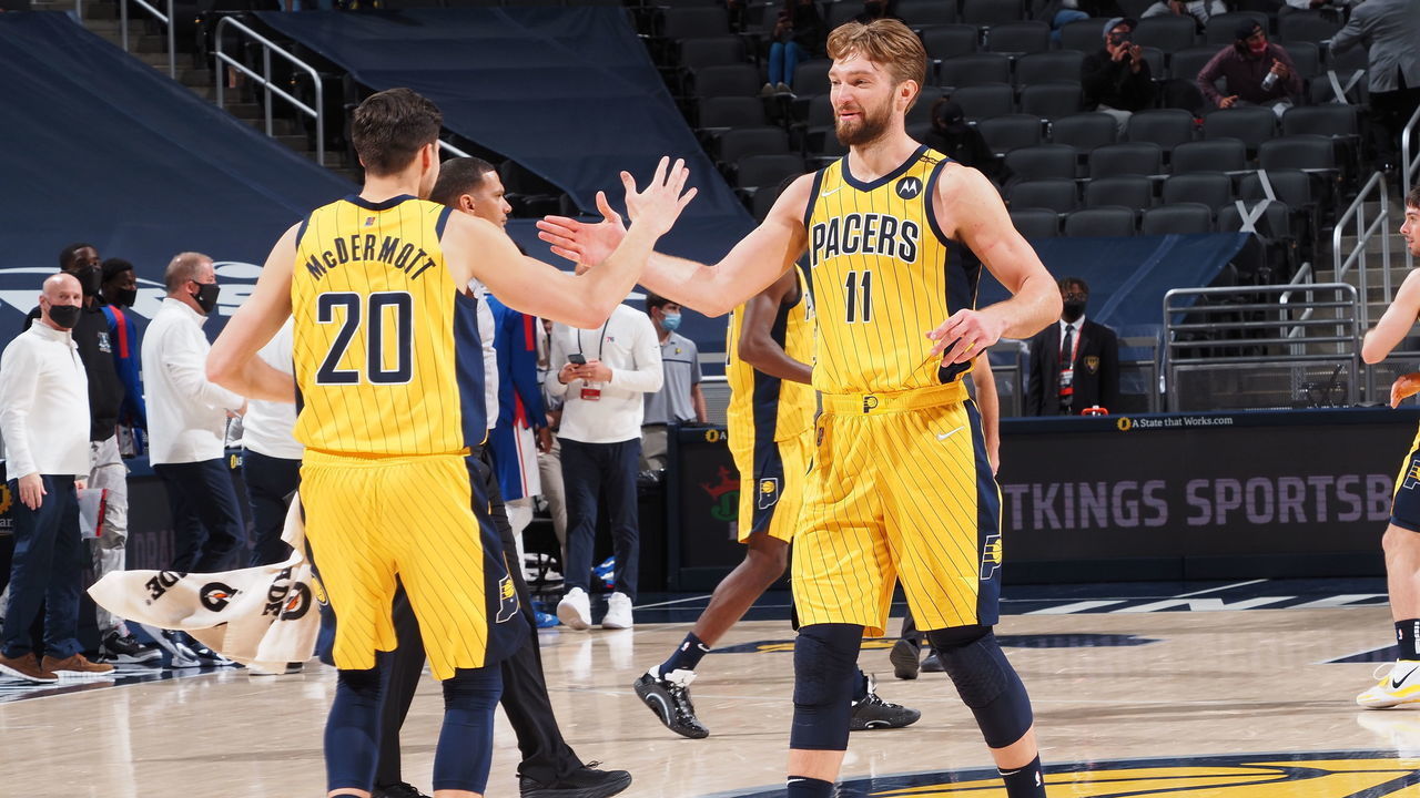 INDIANAPOLIS, IN - MAY 11: Doug McDermott #20 of the Indiana Pacers high fives Domantas Sabonis #11 of the Indiana Pacers during the game against the Philadelphia 76ers on May 11, 2021 at Bankers Life Fieldhouse in Indianapolis, Indiana. Mandatory Copyright Notice: Copyright 2021 NBAE