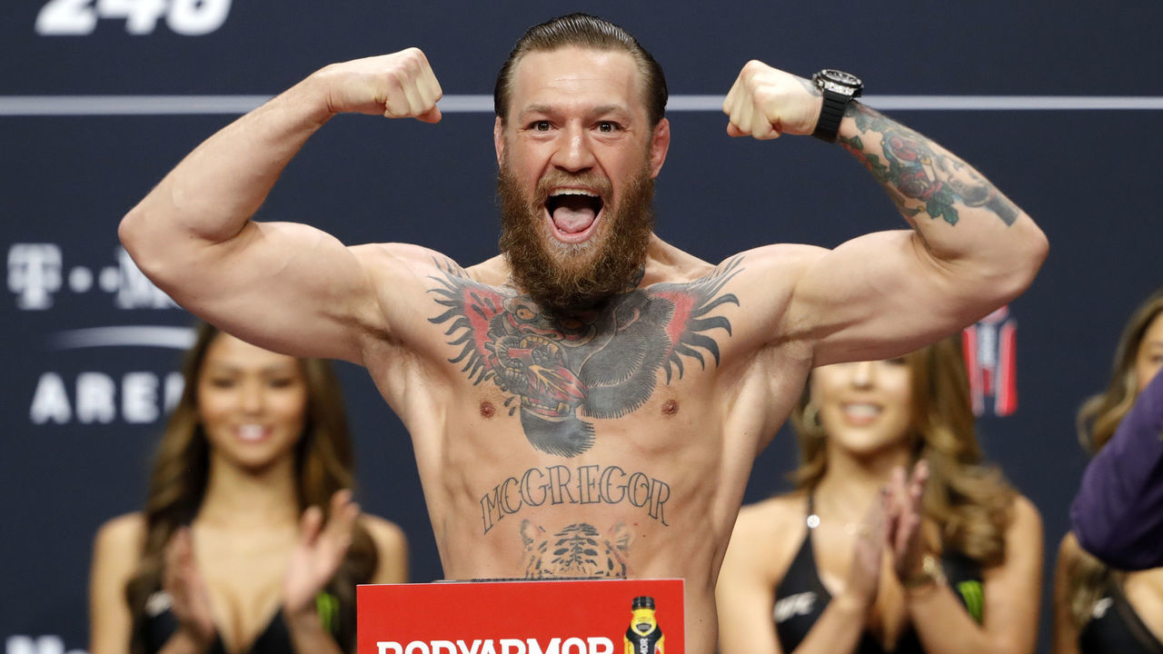 LAS VEGAS, NEVADA - JANUARY 17: Welterweight fighter Conor McGregor poses on the scale during a ceremonial weigh-in for UFC 246 at Park Theater at Park MGM on January 17, 2020 in Las Vegas, Nevada. McGregor will face Donald Cerrone at UFC 246 on January 18 in Las Vegas.