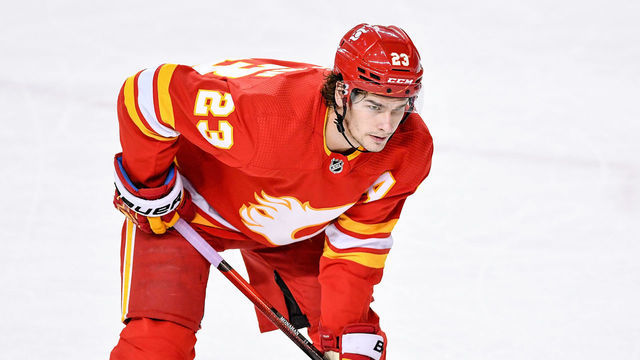 CALGARY, AB - MAY 09: Calgary Flames Center Sean Monahan (23) gets ready for a face-off during the first period of an NHL game where the Calgary Flames hosted the Ottawa Senators on May 9, 2021, at the Scotiabank Saddledome in Calgary, AB.