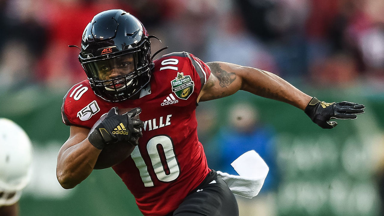 NASHVILLE, TN - DECEMBER 30: Louisville Cardinals running back Javian Hawkins (10) runs the ball during the Music City Bowl game against the Mississippi State Bulldogs on December 30, 2019, at Nissan Stadium in Nashville, TN.