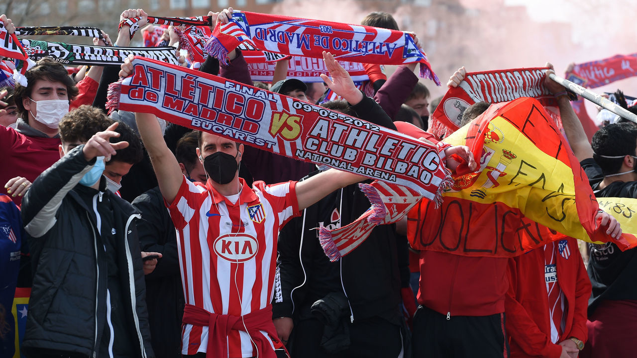 MADRID, SPAIN - MARCH 07: Atletico de Madrid fans show their support outside the stadium prior to the La Liga Santander match between Atletico de Madrid and Real Madrid at Estadio Wanda Metropolitano on March 07, 2021 in Madrid, Spain. Sporting stadiums around Spain remain under strict restrictions due to the Coronavirus Pandemic as Government social distancing laws prohibit fans inside venues resulting in games being played behind closed doors.