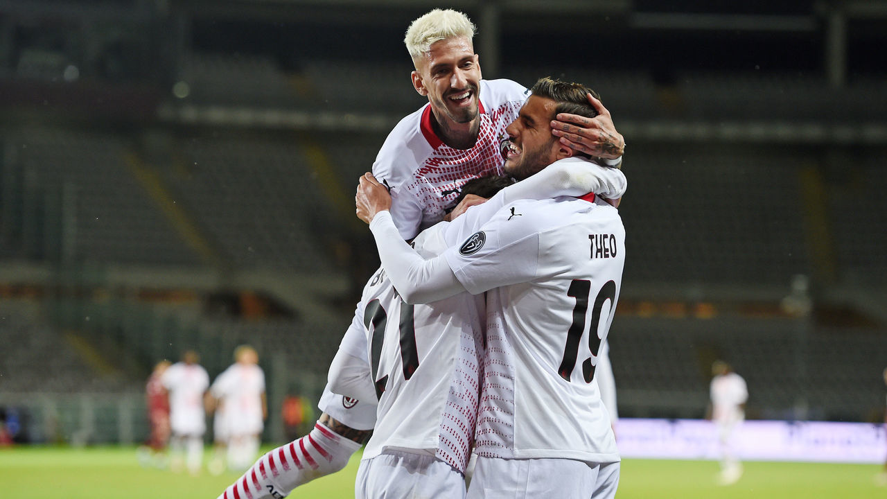 TURIN, ITALY - MAY 12: Theo Hernandez of AC Milan (R) celebrates a goal with team mate Brahim Diaz of AC Milan and Samu Castillejo of AC Milan during the Serie A match between Torino FC and AC Milan at Stadio Olimpico di Torino on May 12, 2021 in Turin, Italy. Sporting stadiums around Italy remain under strict restrictions due to the Coronavirus Pandemic as Government social distancing laws prohibit fans inside venues resulting in games being played behind closed doors.