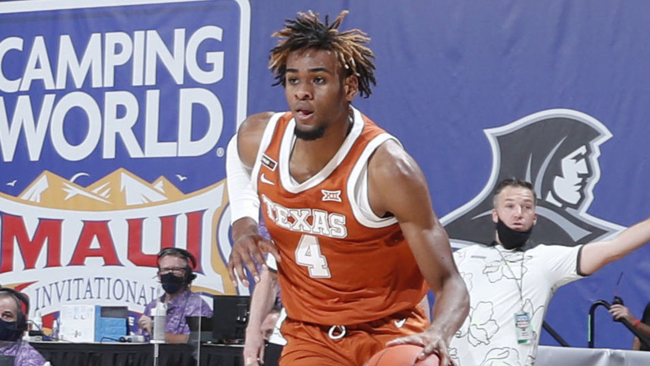 ASHEVILLE, NC - NOVEMBER 30: Texas Longhorns forward Greg Brown III (4) drives to the basket against the Davidson Wildcats during the first half of the first round of the Camping World Maui Invitational on November 30, 2020, at the Harrah's Cherokee Center in Asheville, NC.