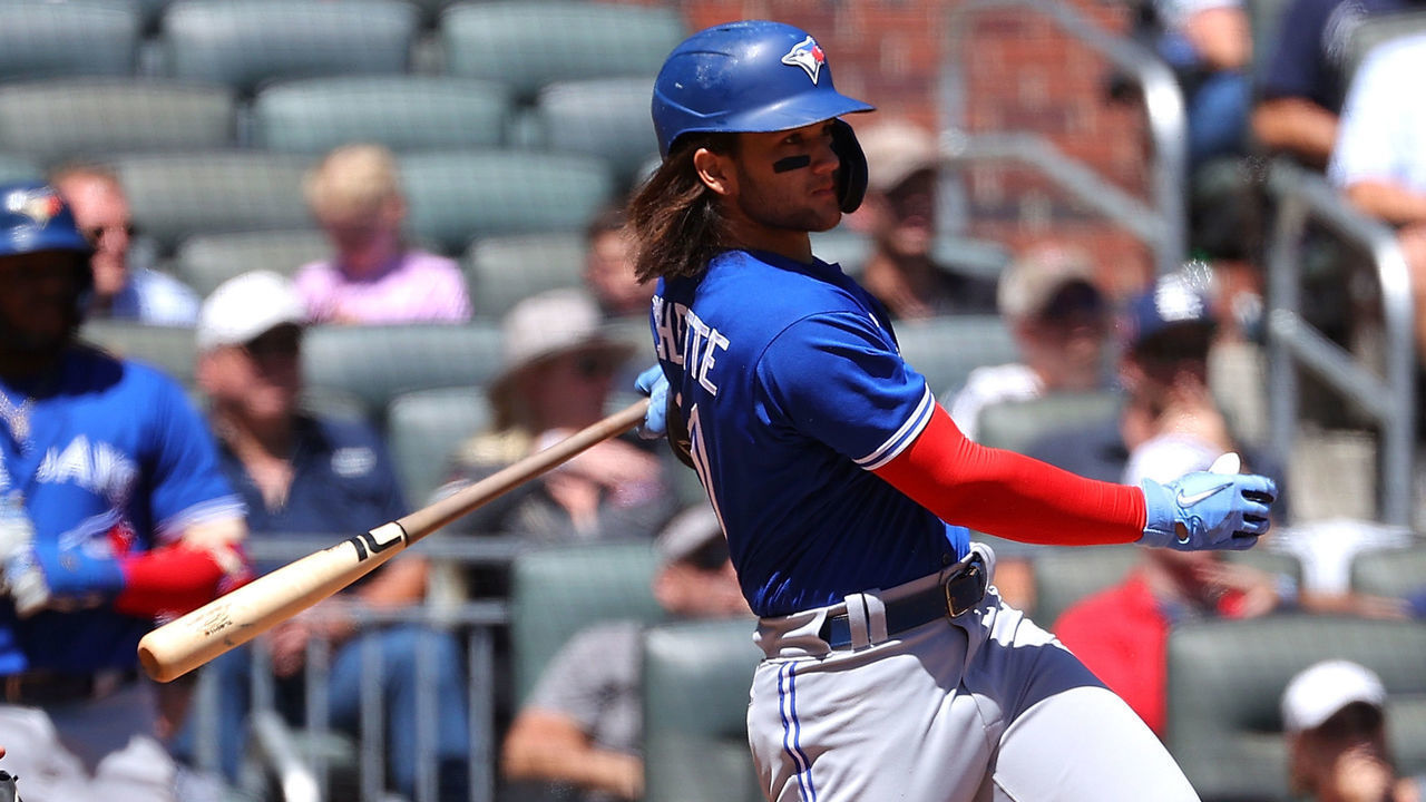 ATLANTA, GEORGIA - MAY 13: Bo Bichette #11 of the Toronto Blue Jays hits a two-RBI double in the ninth inning against the Atlanta Braves at Truist Park on May 13, 2021 in Atlanta, Georgia.