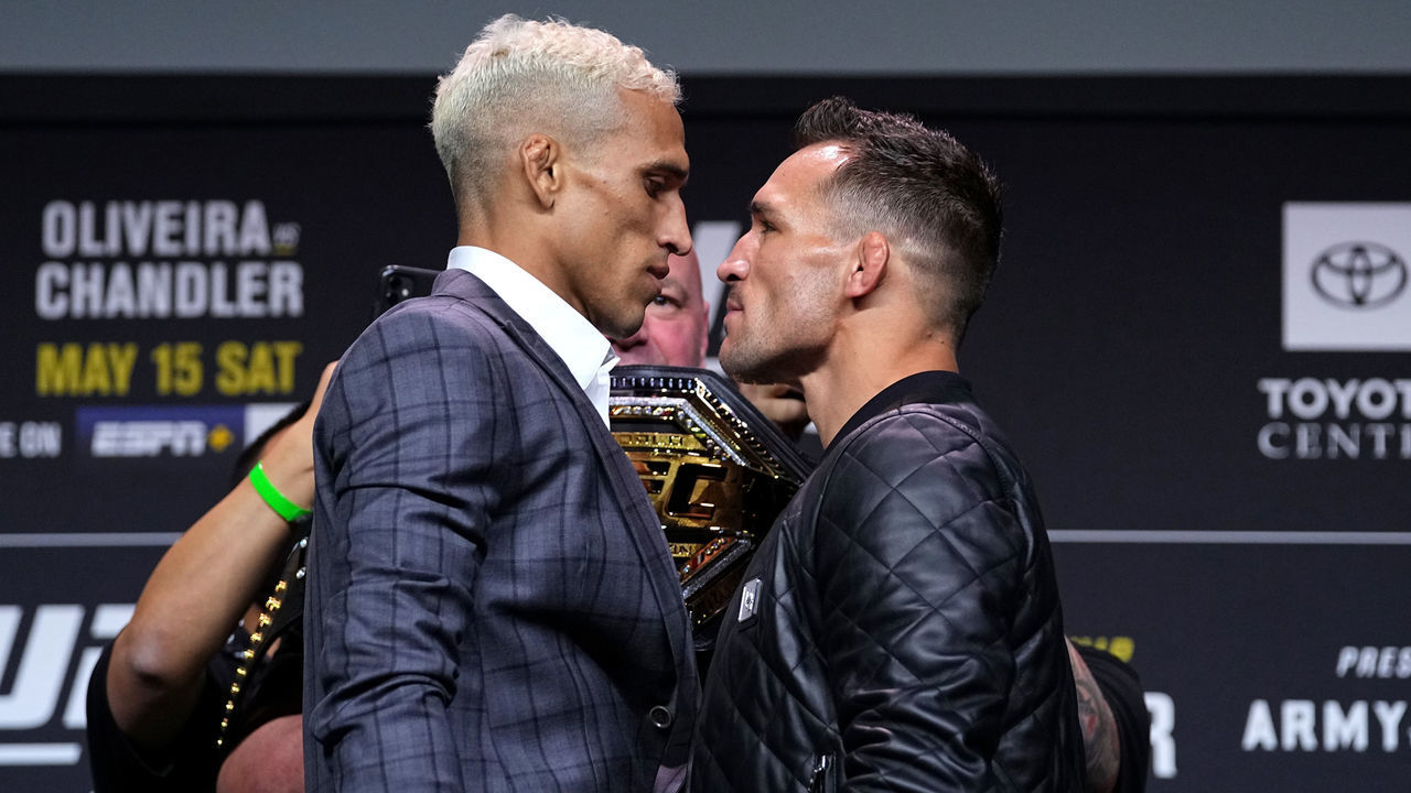 HOUSTON, TEXAS - MAY 13: (L-R) Opponents Charles Oliveira and Michael Chandler face off during the UFC 262 press conference at George R. Brown Convention Center on May 13, 2021 in Houston, Texas.