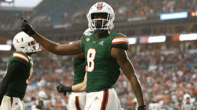 MIAMI, FLORIDA - NOVEMBER 09: Dee Wiggins #8 of the Miami Hurricanes reacts after a touchdown against the Louisville Cardinals during the first half at Hard Rock Stadium on November 09, 2019 in Miami, Florida.