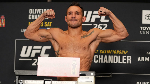 HOUSTON, TEXAS - MAY 14: Michael Chandler poses on the scale during the UFC 262 official weigh-in at the Marriott Marquis Houston on May 14, 2021 in Houston, Texas.