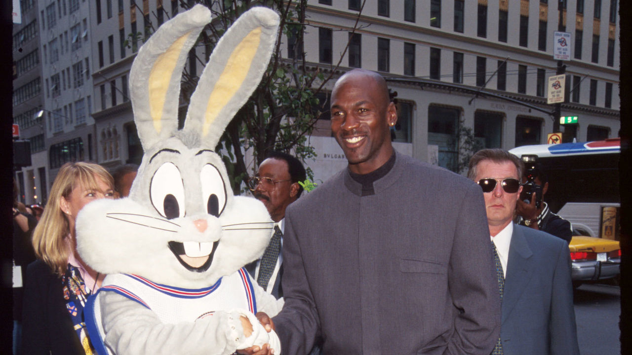 283696 20: Bugs Bunny shakes hands with Michael Jordan at the Warner Bros. Studio store October 23, 1996 in New York City. The store, originally a three floor specialty store, has been redesigned into a nine floor department store with a cafe, interactive attractions, and a screening facility for computer animated 3-D Looney Tunes cartoons under the sponsorship of Jordan.