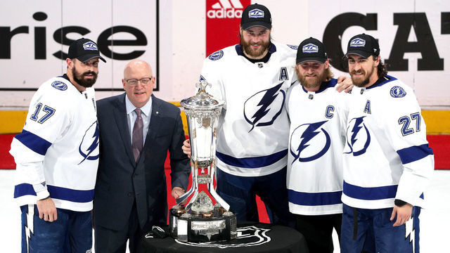 EDMONTON, ALBERTA - SEPTEMBER 17: Alex Killorn #17 of the Tampa Bay Lightning, NHL Deputy Commissioner Bill Daly, Victor Hedman #77, Steven Stamkos #91 and Ryan McDonagh #27 of the Tampa Bay Lightning pose with the Prince of Wales Trophy after the Lightning won 2-1 in the first overtime period of Game Six of the Eastern Conference Final of the 2020 NHL Stanley Cup Playoffs between the Tampa Bay Lightning and the New York Islanders at Rogers Place on September 17, 2020 in Edmonton, Alberta. The Lightning defeated the Islanders 2-1 in overtime of game six to take the best of seven game series 4-2.