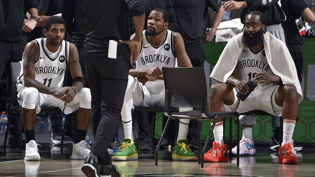 CLEVELAND, OH - JANUARY 20: Kyrie Irving #11, Kevin Durant #7, and James Harden #13 of the Brooklyn Nets huddle up during the game against the Cleveland Cavaliers on January 20, 2021 at Rocket Mortgage FieldHouse in Cleveland, Ohio. NOTE TO USER: User expressly acknowledges and agrees that, by downloading and/or using this Photograph, user is consenting to the terms and conditions of the Getty Images License Agreement. Mandatory Copyright Notice: Copyright 2021 NBAE