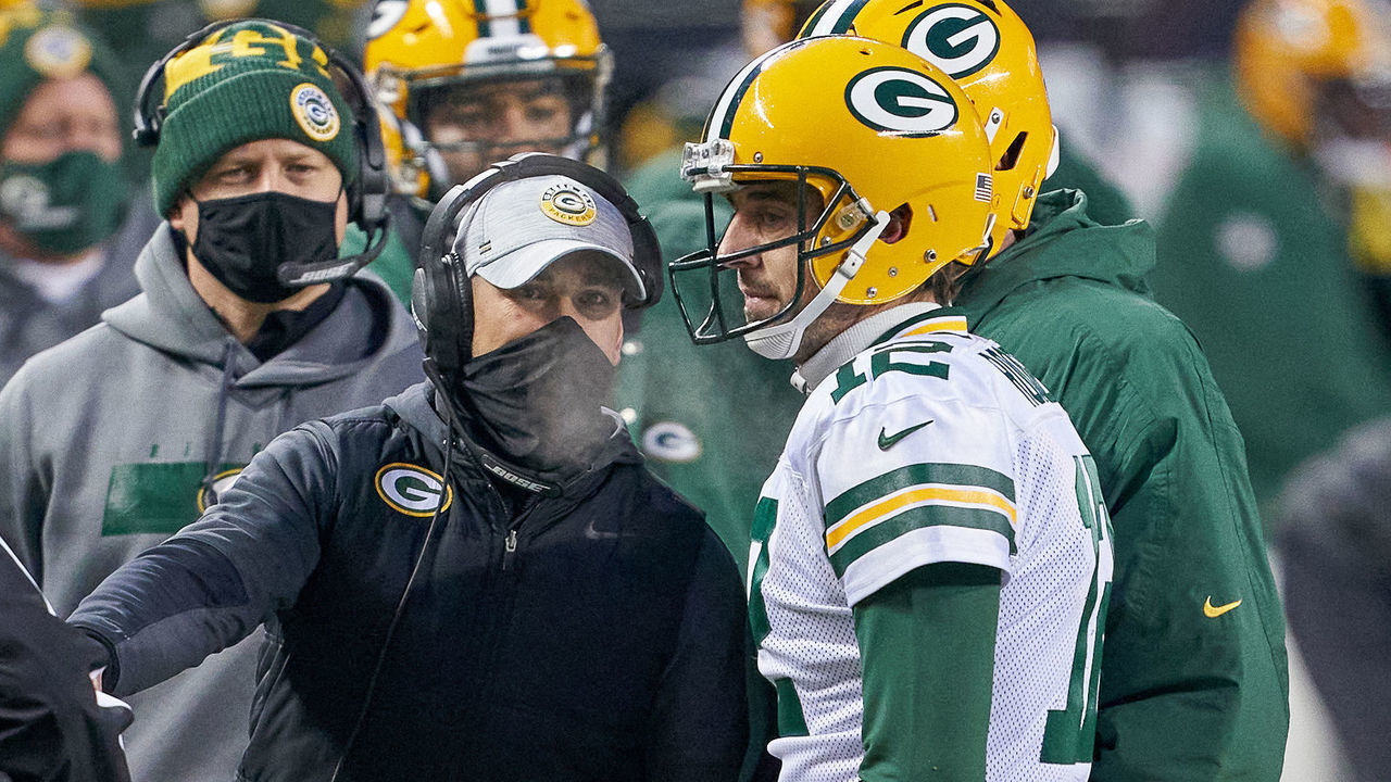 CHICAGO, IL - JANUARY 03: Green Bay Packers quarterback Aaron Rodgers (12) talks with Green Bay Packers head coach Matt LaFleur in action during a game between the Chicago Bears and the Green Bay Packers on January 03, 2021 at Soldier Field in Chicago, IL.