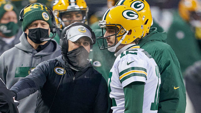 CHICAGO, IL - JANUARY 03: Green Bay Packers quarterback Aaron Rodgers (12) talks with Green Bay Packers head coach Matt LaFleur in action during a game between the Chicago Bears and the Green Bay Packers on January 03, 2021 at Soldier Field in Chicago, IL.